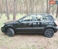 Чорний Кіа Ріо, об'ємом двигуна 1.34 л та пробігом 167 тис. км за 5000 $, фото 4 на Automoto.ua