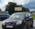 Чорний Кіа Ріо, об'ємом двигуна 1.4 л та пробігом 218 тис. км за 4250 $, фото 1 на Automoto.ua