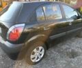 Черный Киа Рио, объемом двигателя 1.4 л и пробегом 174 тыс. км за 5514 $, фото 2 на Automoto.ua