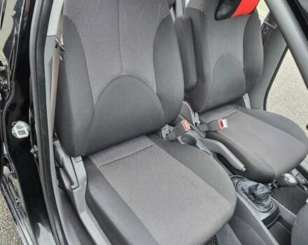 Черный Киа Рио, объемом двигателя 1.4 л и пробегом 250 тыс. км за 4300 $, фото 14 на Automoto.ua