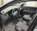 Черный Киа Рио, объемом двигателя 1.4 л и пробегом 110 тыс. км за 6156 $, фото 4 на Automoto.ua
