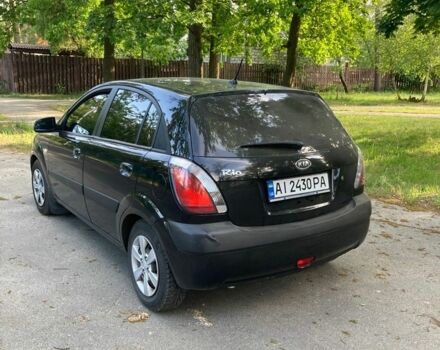 Чорний Кіа Ріо, об'ємом двигуна 1.4 л та пробігом 227 тис. км за 4800 $, фото 4 на Automoto.ua