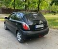 Чорний Кіа Ріо, об'ємом двигуна 1.4 л та пробігом 227 тис. км за 4800 $, фото 4 на Automoto.ua