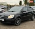 Чорний Кіа Ріо, об'ємом двигуна 1.4 л та пробігом 209 тис. км за 5900 $, фото 1 на Automoto.ua