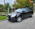 Черный Киа Рио, объемом двигателя 1.4 л и пробегом 184 тыс. км за 4999 $, фото 1 на Automoto.ua