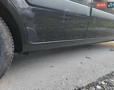 Чорний Кіа Ріо, об'ємом двигуна 1.4 л та пробігом 184 тис. км за 4800 $, фото 42 на Automoto.ua