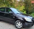 Черный Киа Рио, объемом двигателя 1.4 л и пробегом 184 тыс. км за 4999 $, фото 6 на Automoto.ua
