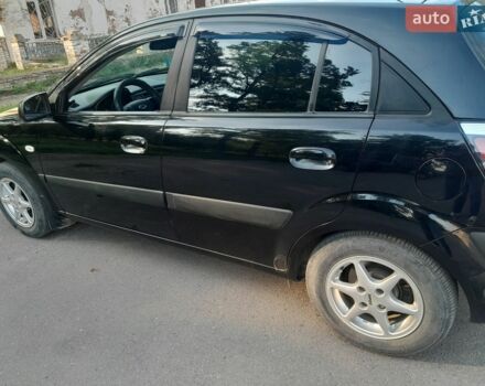 Чорний Кіа Ріо, об'ємом двигуна 1.4 л та пробігом 200 тис. км за 4500 $, фото 1 на Automoto.ua