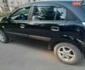 Чорний Кіа Ріо, об'ємом двигуна 1.4 л та пробігом 200 тис. км за 4500 $, фото 1 на Automoto.ua
