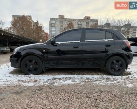 Черный Киа Рио, объемом двигателя 1.4 л и пробегом 245 тыс. км за 4300 $, фото 3 на Automoto.ua