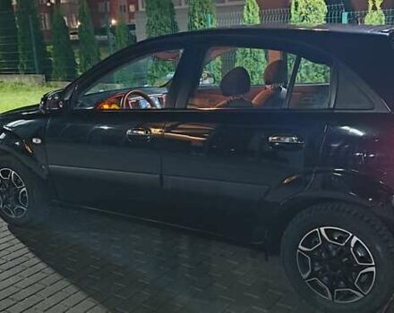 Черный Киа Рио, объемом двигателя 1.4 л и пробегом 293 тыс. км за 4500 $, фото 2 на Automoto.ua