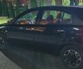 Черный Киа Рио, объемом двигателя 1.4 л и пробегом 293 тыс. км за 4500 $, фото 2 на Automoto.ua