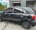 Чорний Кіа Ріо, об'ємом двигуна 1.4 л та пробігом 207 тис. км за 3952 $, фото 3 на Automoto.ua