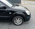 Черный Киа Рио, объемом двигателя 1.4 л и пробегом 203 тыс. км за 4499 $, фото 21 на Automoto.ua