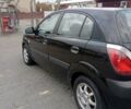 Черный Киа Рио, объемом двигателя 1.4 л и пробегом 203 тыс. км за 4499 $, фото 37 на Automoto.ua