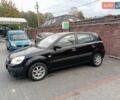 Черный Киа Рио, объемом двигателя 1.4 л и пробегом 203 тыс. км за 4499 $, фото 2 на Automoto.ua