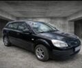 Черный Киа Рио, объемом двигателя 1.4 л и пробегом 212 тыс. км за 3600 $, фото 1 на Automoto.ua