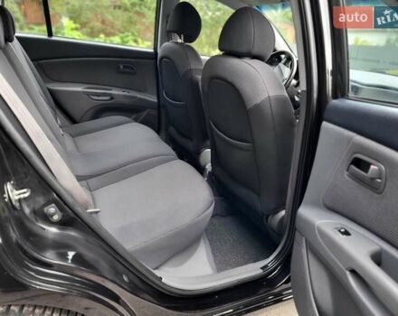Черный Киа Рио, объемом двигателя 1.4 л и пробегом 184 тыс. км за 4999 $, фото 74 на Automoto.ua