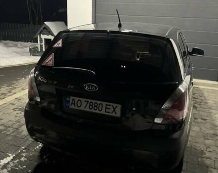 Чорний Кіа Ріо, об'ємом двигуна 1.4 л та пробігом 152 тис. км за 4500 $, фото 1 на Automoto.ua