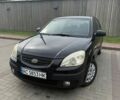 Черный Киа Рио, объемом двигателя 1.4 л и пробегом 230 тыс. км за 4400 $, фото 1 на Automoto.ua