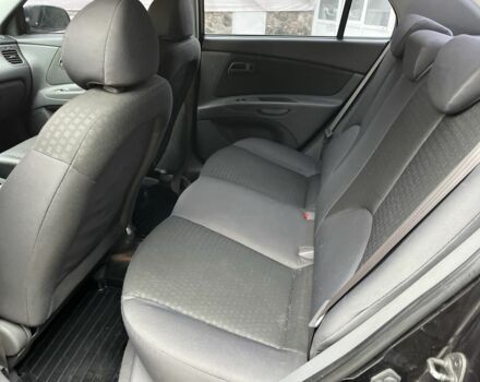 Чорний Кіа Ріо, об'ємом двигуна 1.4 л та пробігом 55 тис. км за 6800 $, фото 19 на Automoto.ua