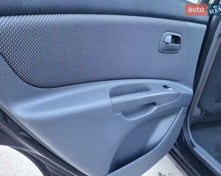 Чорний Кіа Ріо, об'ємом двигуна 1.4 л та пробігом 184 тис. км за 4800 $, фото 12 на Automoto.ua