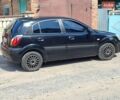 Черный Киа Рио, объемом двигателя 1.4 л и пробегом 205 тыс. км за 3800 $, фото 1 на Automoto.ua