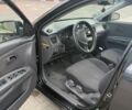 Черный Киа Рио, объемом двигателя 1.4 л и пробегом 230 тыс. км за 4400 $, фото 11 на Automoto.ua