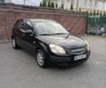 Черный Киа Рио, объемом двигателя 1.4 л и пробегом 203 тыс. км за 4499 $, фото 1 на Automoto.ua