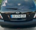 Чорний Кіа Ріо, об'ємом двигуна 1.4 л та пробігом 200 тис. км за 4500 $, фото 2 на Automoto.ua