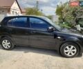 Черный Киа Рио, объемом двигателя 1.4 л и пробегом 220 тыс. км за 4500 $, фото 2 на Automoto.ua