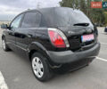 Черный Киа Рио, объемом двигателя 1.4 л и пробегом 158 тыс. км за 5000 $, фото 11 на Automoto.ua