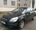 Черный Киа Рио, объемом двигателя 1.4 л и пробегом 205 тыс. км за 4100 $, фото 1 на Automoto.ua