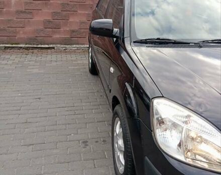 Черный Киа Рио, объемом двигателя 1.4 л и пробегом 203 тыс. км за 4499 $, фото 9 на Automoto.ua