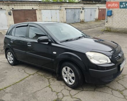 Черный Киа Рио, объемом двигателя 1.4 л и пробегом 110 тыс. км за 5999 $, фото 2 на Automoto.ua