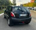 Черный Киа Рио, объемом двигателя 1.4 л и пробегом 226 тыс. км за 3600 $, фото 5 на Automoto.ua