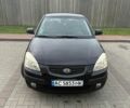 Черный Киа Рио, объемом двигателя 1.4 л и пробегом 230 тыс. км за 4400 $, фото 2 на Automoto.ua