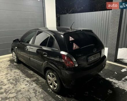 Чорний Кіа Ріо, об'ємом двигуна 1.4 л та пробігом 152 тис. км за 4500 $, фото 5 на Automoto.ua