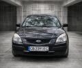 Черный Киа Рио, объемом двигателя 1.4 л и пробегом 212 тыс. км за 3600 $, фото 1 на Automoto.ua