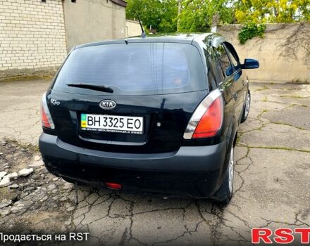 Черный Киа Рио, объемом двигателя 1.4 л и пробегом 110 тыс. км за 6399 $, фото 4 на Automoto.ua