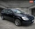 Черный Киа Рио, объемом двигателя 1.4 л и пробегом 212 тыс. км за 4000 $, фото 1 на Automoto.ua