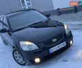 Черный Киа Рио, объемом двигателя 1.6 л и пробегом 233 тыс. км за 4199 $, фото 2 на Automoto.ua
