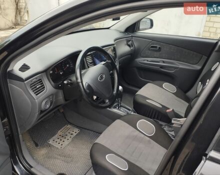 Черный Киа Рио, объемом двигателя 1.4 л и пробегом 110 тыс. км за 5999 $, фото 4 на Automoto.ua