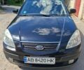 Черный Киа Рио, объемом двигателя 1.4 л и пробегом 205 тыс. км за 3800 $, фото 1 на Automoto.ua