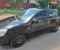 Черный Киа Рио, объемом двигателя 1.4 л и пробегом 205 тыс. км за 3800 $, фото 4 на Automoto.ua