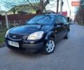 Чорний Кіа Ріо, об'ємом двигуна 1.4 л та пробігом 184 тис. км за 4800 $, фото 24 на Automoto.ua
