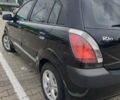 Чорний Кіа Ріо, об'ємом двигуна 1.4 л та пробігом 173 тис. км за 5250 $, фото 5 на Automoto.ua
