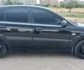 Черный Киа Рио, объемом двигателя 1.4 л и пробегом 144 тыс. км за 4600 $, фото 2 на Automoto.ua