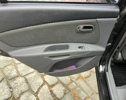 Чорний Кіа Ріо, об'ємом двигуна 1.4 л та пробігом 55 тис. км за 6800 $, фото 17 на Automoto.ua