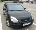 Чорний Кіа Ріо, об'ємом двигуна 1.4 л та пробігом 173 тис. км за 5250 $, фото 1 на Automoto.ua